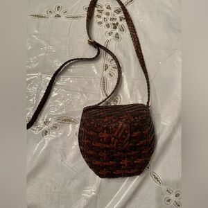 Vintage CEM genuine leather Woven rust,green,& eggplant  colored Crossbody Bag .